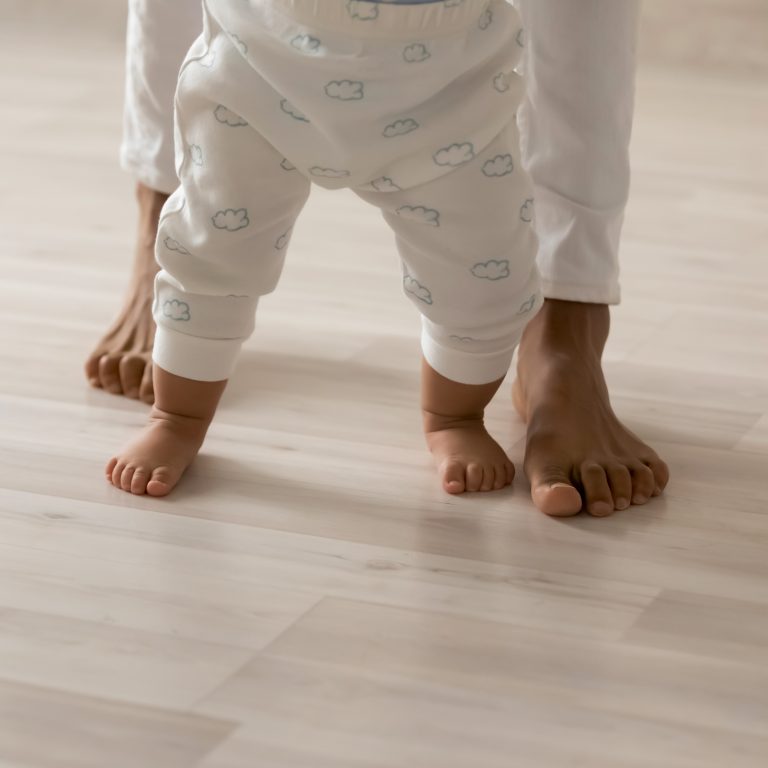 Close,Up,Barefoot,African,American,Woman,With,Toddler,Child,Standing